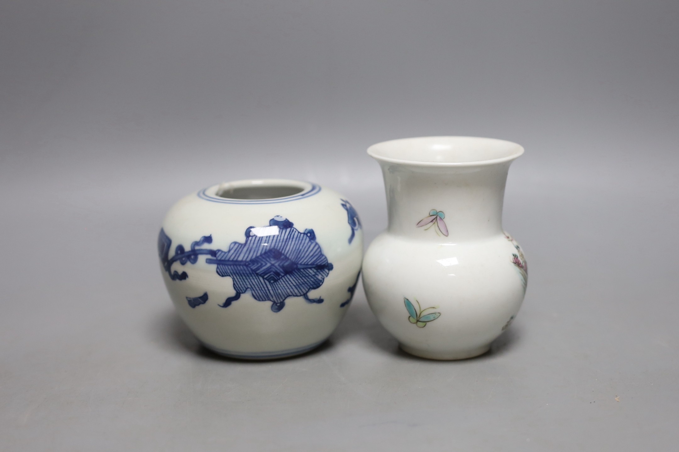 A Chinese famille rose vase, 10cm, together with a Chinese blue and white water pot, 9cm high